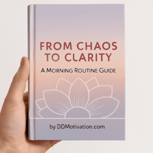 "A hand holding a book titled 'From Chaos to Clarity: A Morning Routine Guide.' The cover features a line drawing of a lotus flower over a soft, sunrise-colored gradient background. The author is listed as DDMotivation.com."