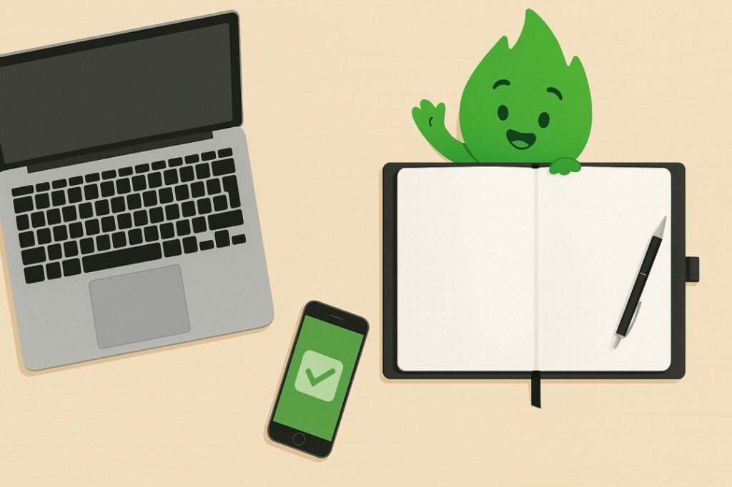 An organized desk showing the tools of a personal productivity system, including a laptop and a paper notebook.